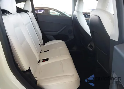 2023 Tesla Model Y Awd/Long Range Dual Motor All-Wheel Drive z USA, uszkodzony, nr VIN 7SAYGDEE1PF627623